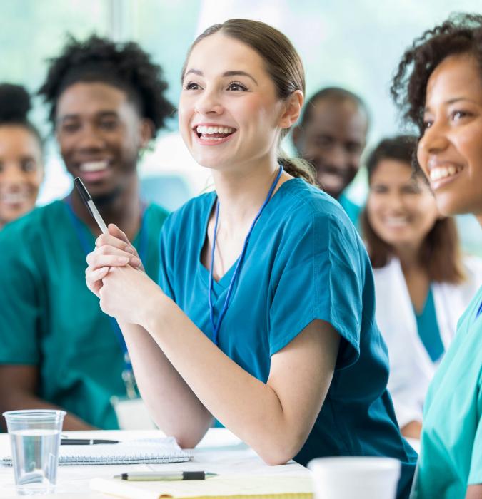 A class of enthusiastic nursing students.